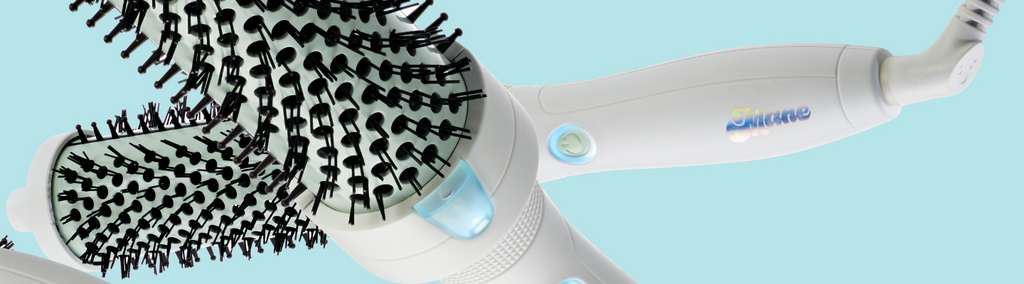 Mane's It's Giving Body Hot Round Brushes floating on a blue background