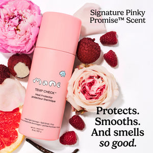 Pink bottle of 'Temp Check' heat protector with flowers and raspberries on a white background. Protects. Smooths. And smells so good.