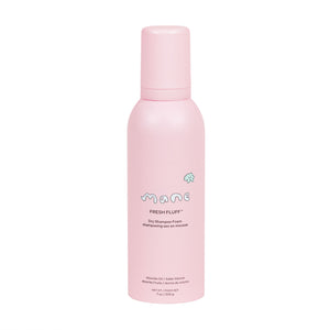 Pink bottle of 'Fresh Fluff' dry shampoo foam on a white background