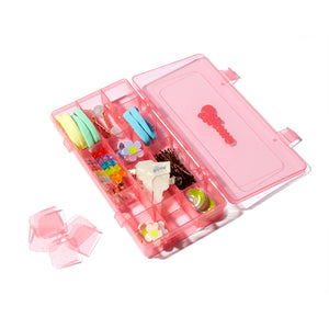 Everything Pin Kit opened and filled with hair ties, bobby pins, and hair clips