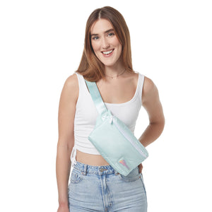 Puffy crossbody belt bag in mint green on model