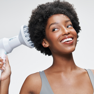 model using This Totally Blows! Ionic Compact Hair Dryer & Attachments