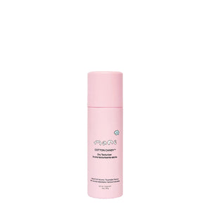 Pink bottle of 'Mane' Cotton Candy Dry Texturizer on a white background