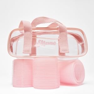 Roll & Scroll Self-Grip Rollers with clear pink case on top of them
