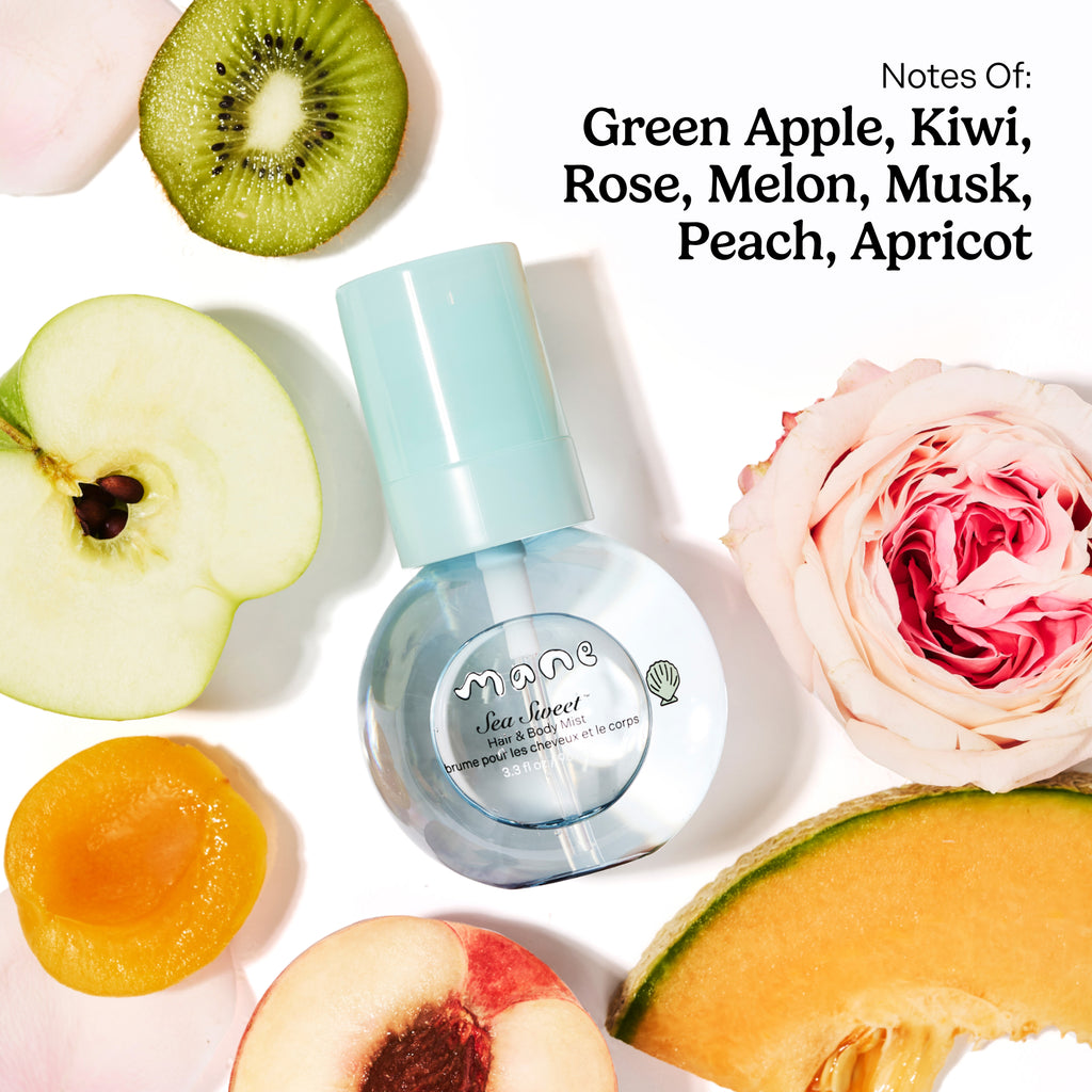 Perfume bottle with fruit and flower elements on a white background. Notes of: Green Apple, Kiwi, Rose, Melon, Musk, PEach, Apricot.