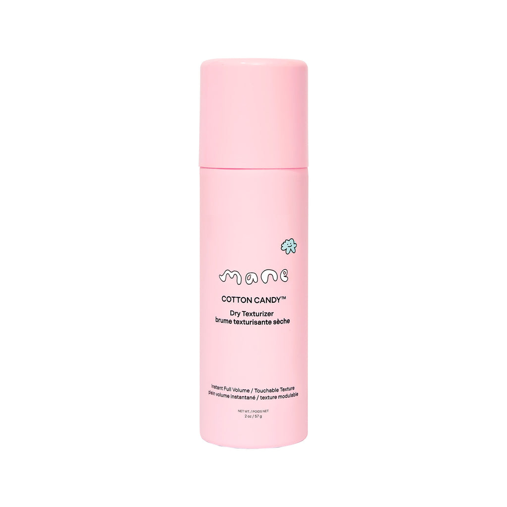 Pink bottle of 'Cotton Candy' dry texturizer by 'mane' on a white background