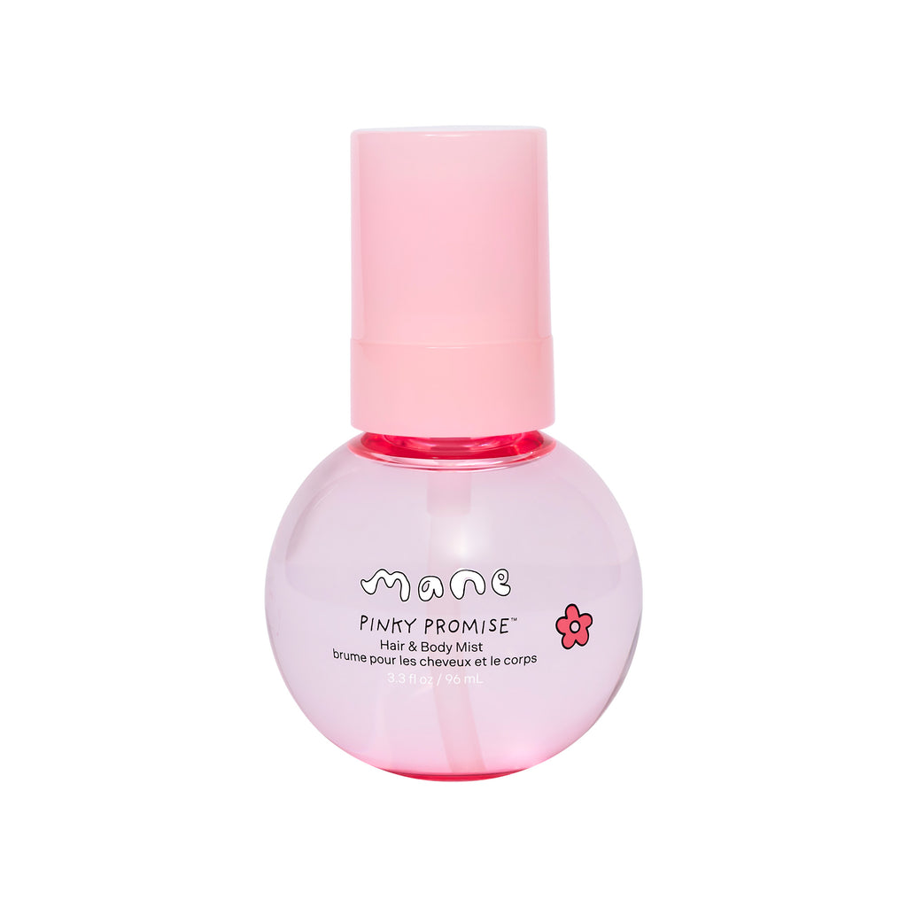 Pink bottle of 'Pinky Promise' hair and body mist by mane on a white background