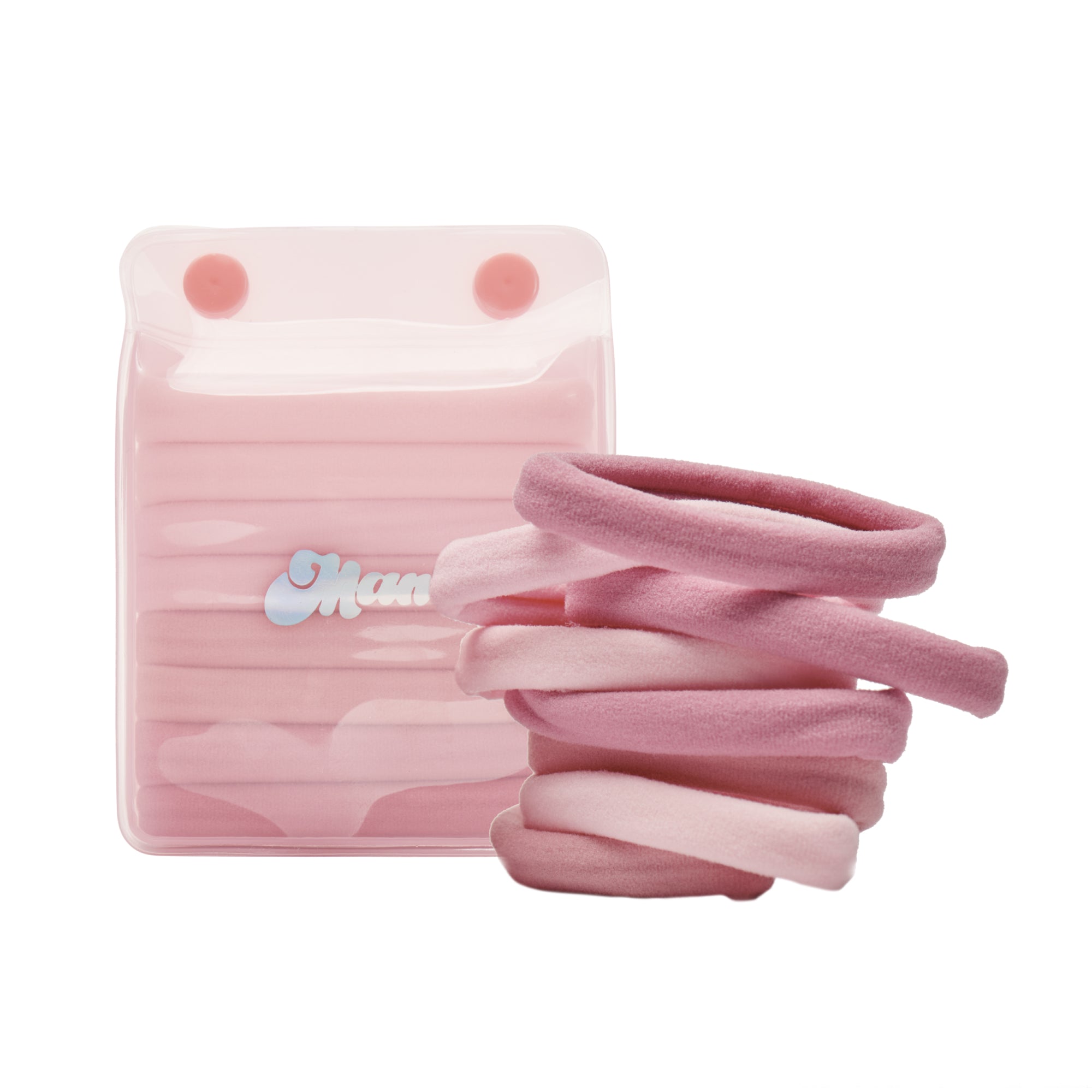 Pastel Hair Ties stacked next to a pink "Mane" branded bag on a white background