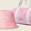 mane puffy bucket hat and pink terry tote