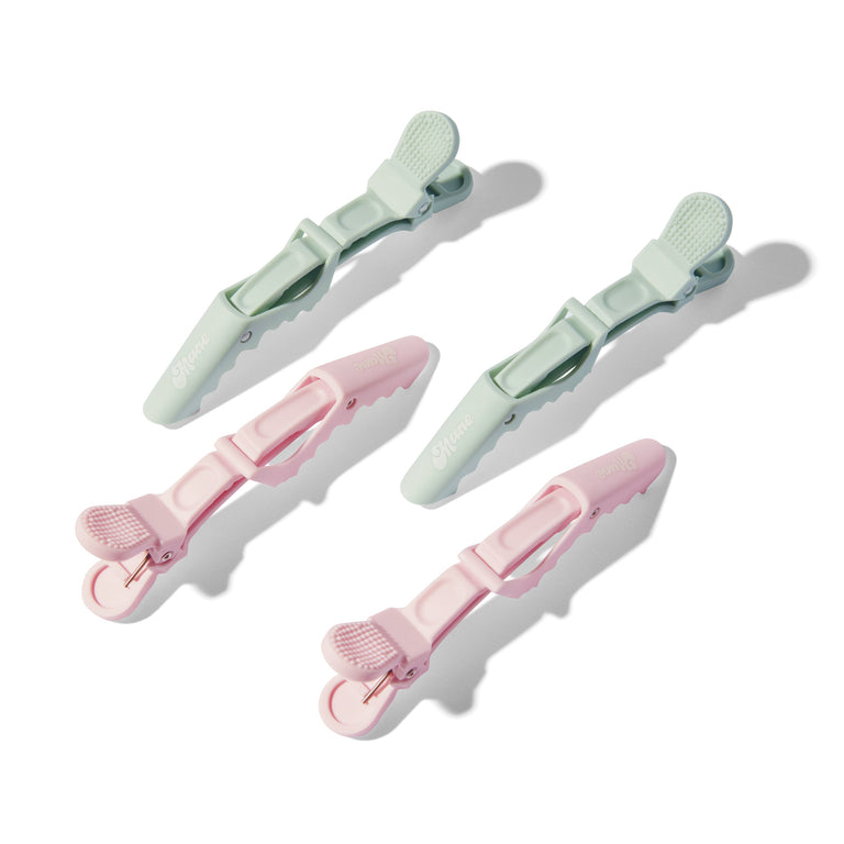 All grip, no slip sectioning clips in green and pink