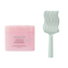 Pink hair mask container with a green comb on a white background