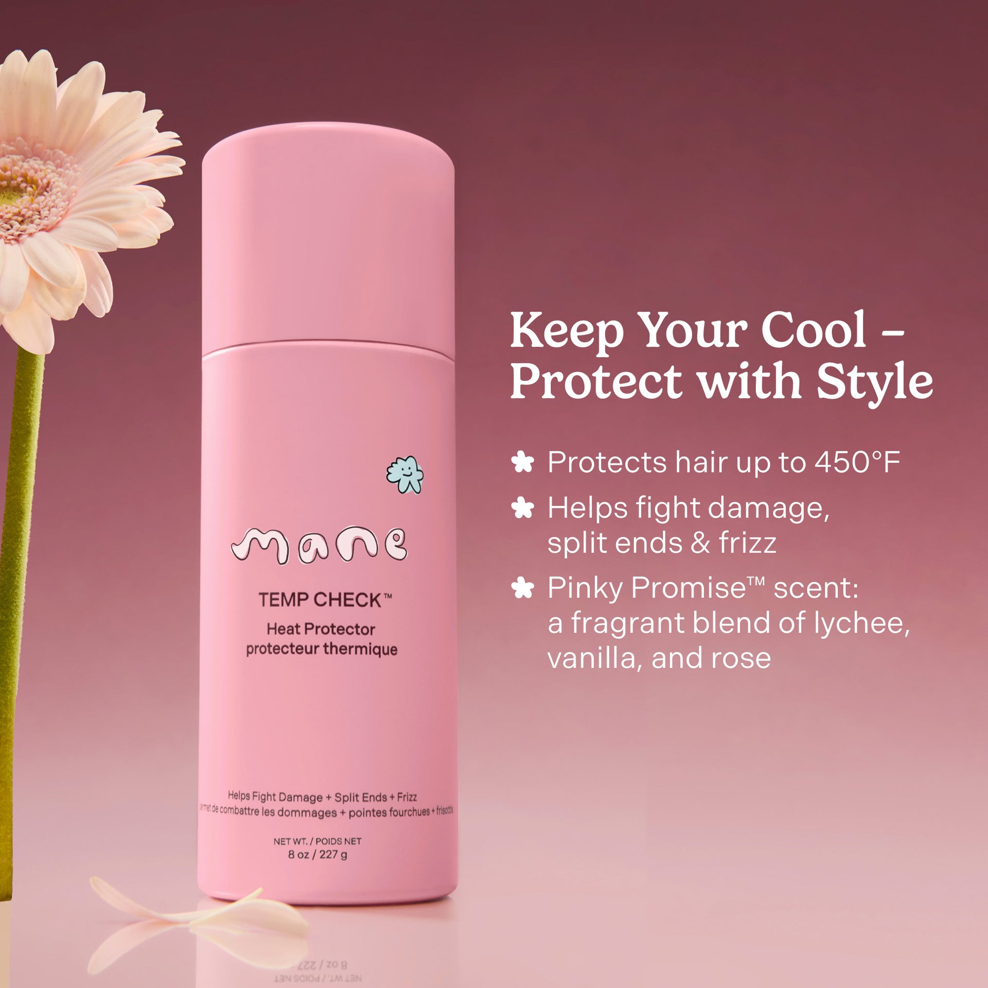 Pink heat protector bottle with floral elements on a pink background
